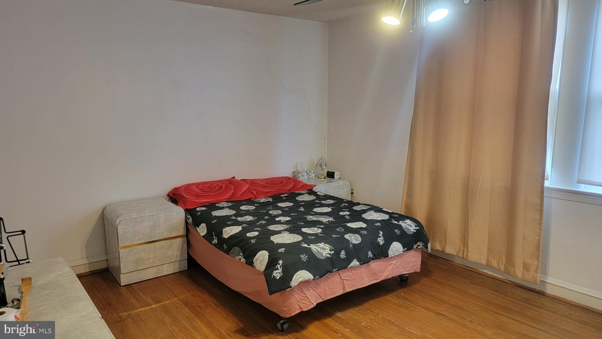 6024 Reach Street Philadelphia, PA 19111 - Photo 13 of 18 a bedroom with a bed in it