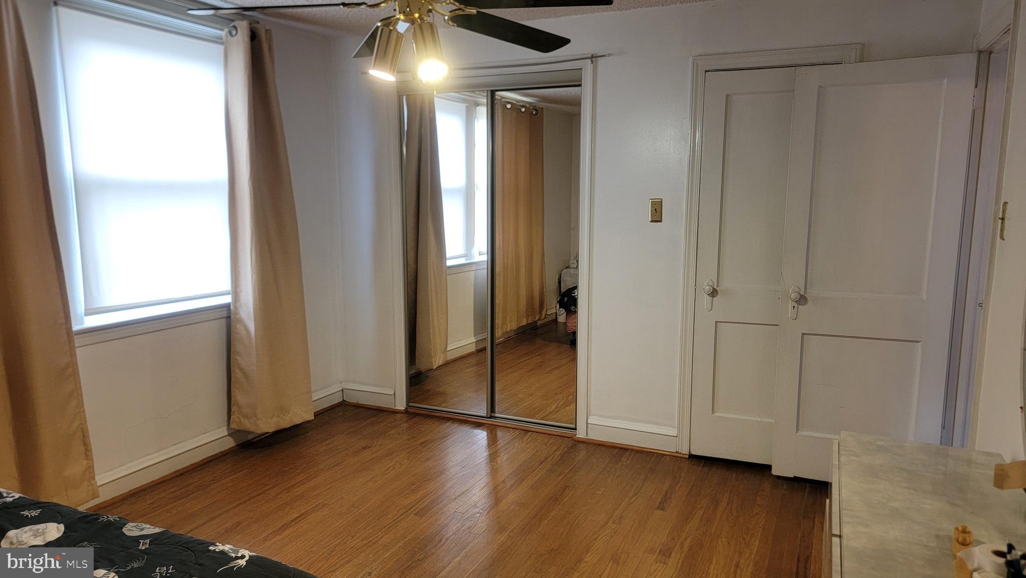 6024 Reach Street Philadelphia, PA 19111 - Photo 14 of 18 a view of empty room with wooden floor