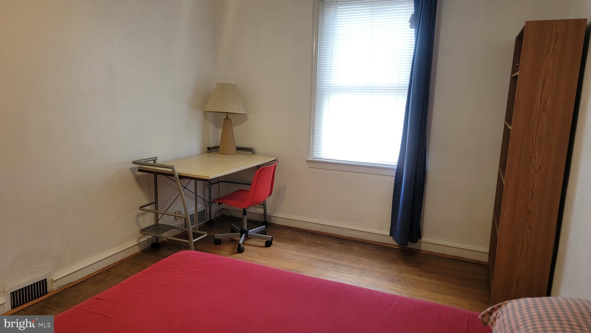 6024 Reach Street Philadelphia, PA 19111 - Photo 16 of 18 a view of a workspace with furniture and a window