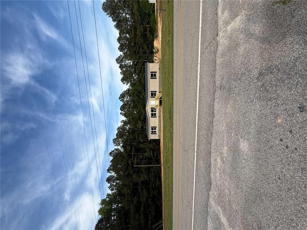 1052 Jones Ferry Road Elberton, GA 30635 - Photo 2 of 16 a view of swimming pool and mountain