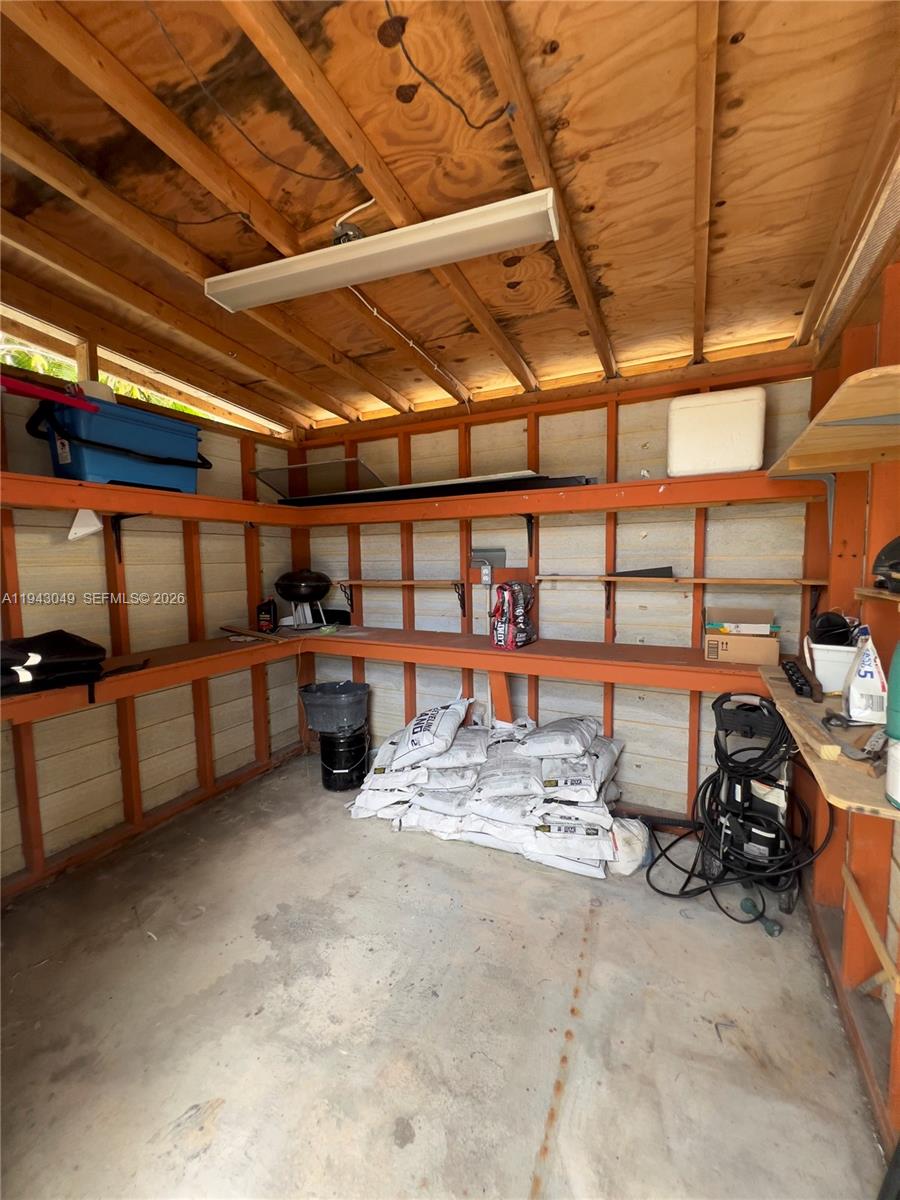 2761 Southwest 33rd Court, Unit A Miami, FL 33133 - Photo 22 of 22 a view of a garage with storage