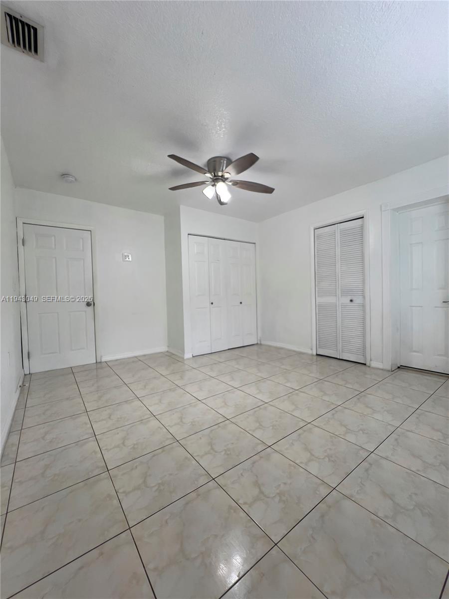 2761 Southwest 33rd Court, Unit A Miami, FL 33133 - Photo 9 of 22 a view of an empty room