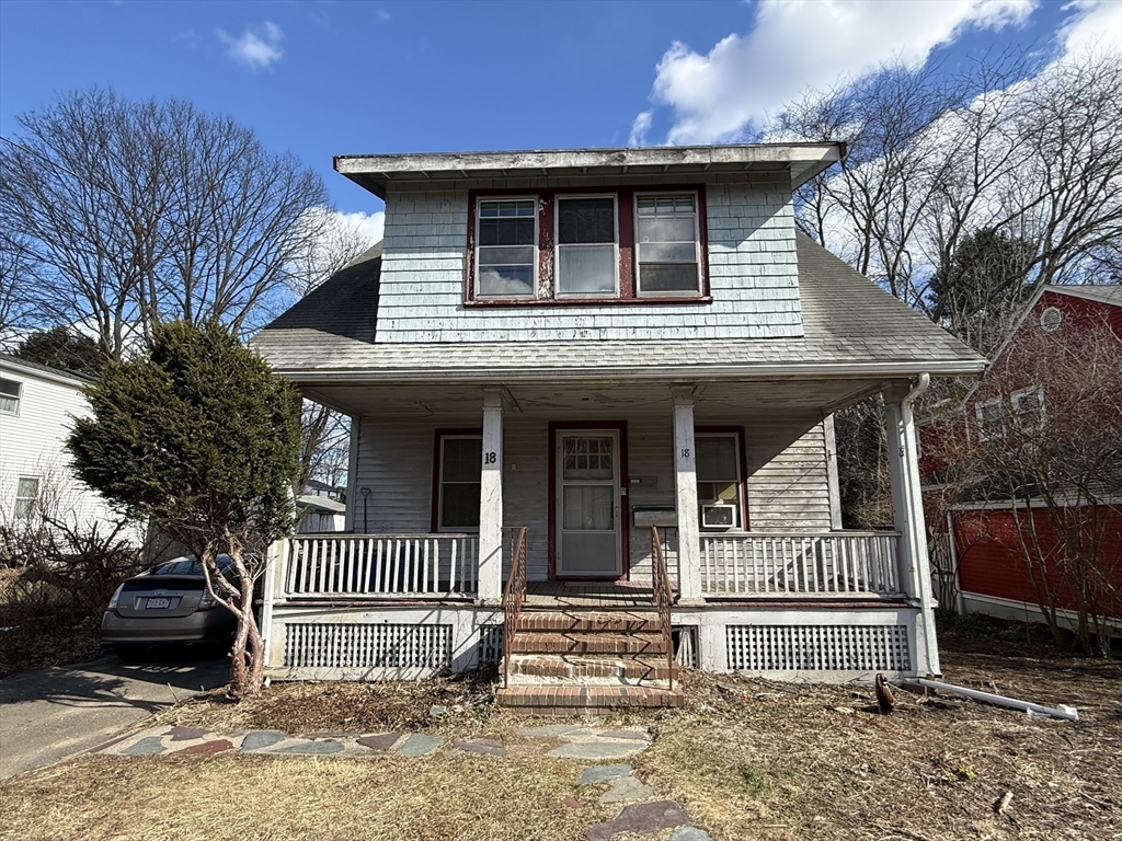 18 Spring Street Lexington, MA 02421 - Photo 2 of 21 a front view of a house with a yard