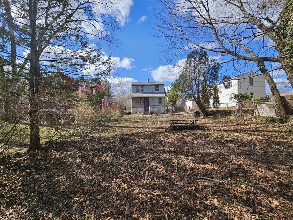 18 Spring Street Lexington, MA 02421 - Photo 3 of 21 a view of a house with a yard