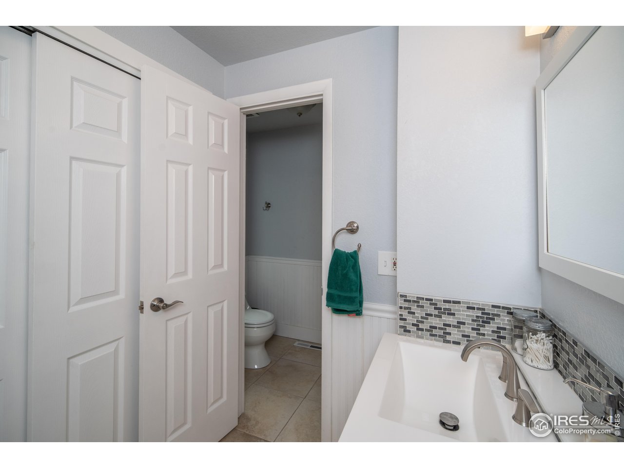 10879 West 65th Way Arvada, CO 80004 - Photo 22 of 39 a bathroom with a sink and a toilet