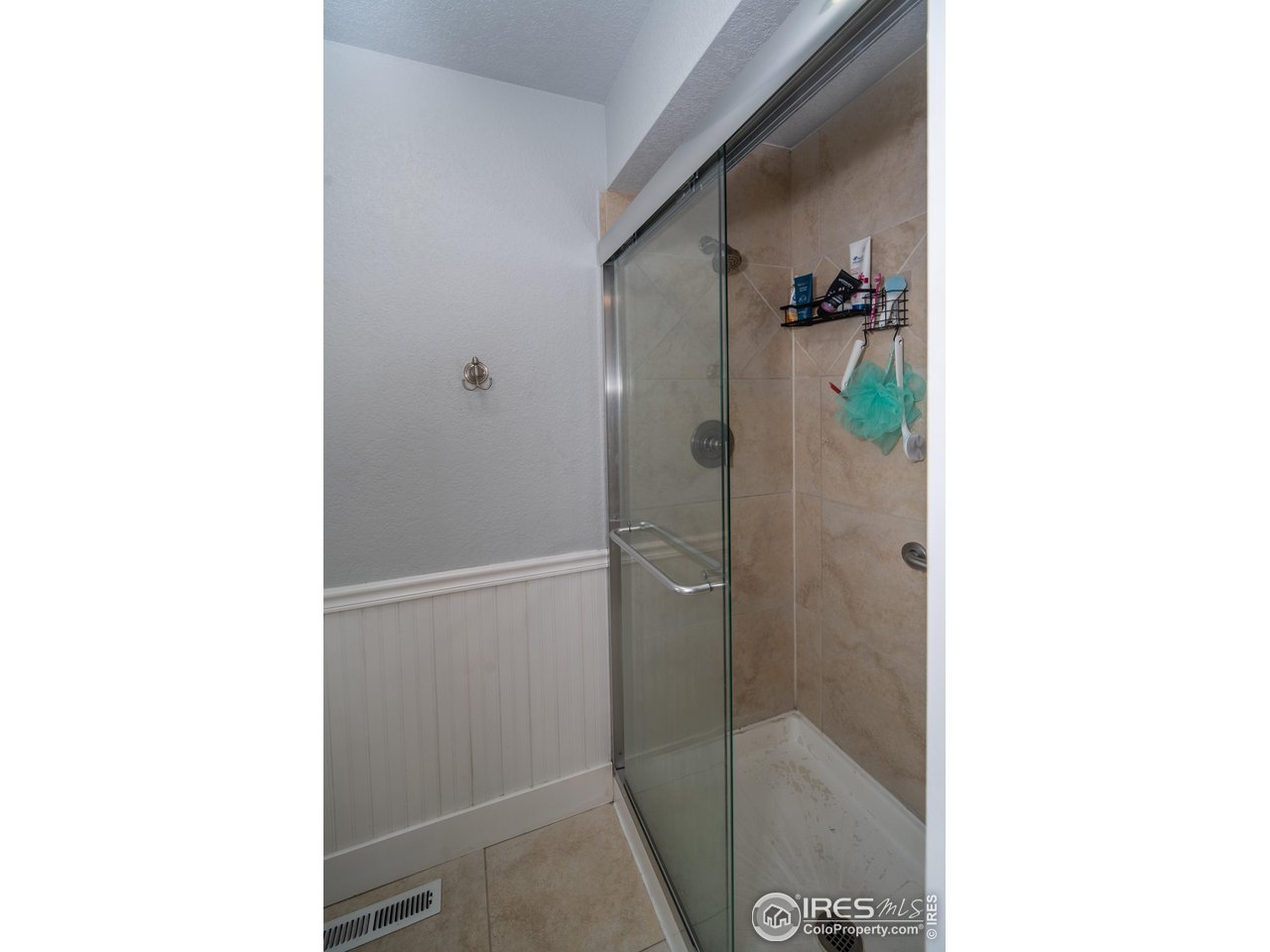 10879 West 65th Way Arvada, CO 80004 - Photo 24 of 39 a bathroom with a shower