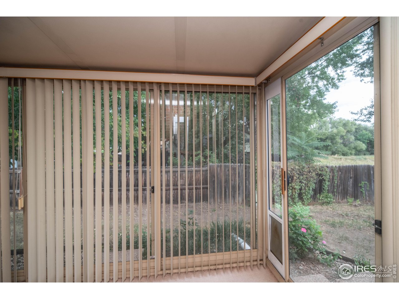 10879 West 65th Way Arvada, CO 80004 - Photo 39 of 39 a black and white wall with a large window