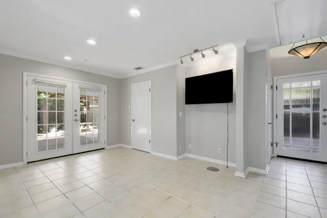 a view of a livingroom with a flat screen tv