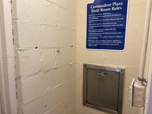 a view of a lake with tall buildings