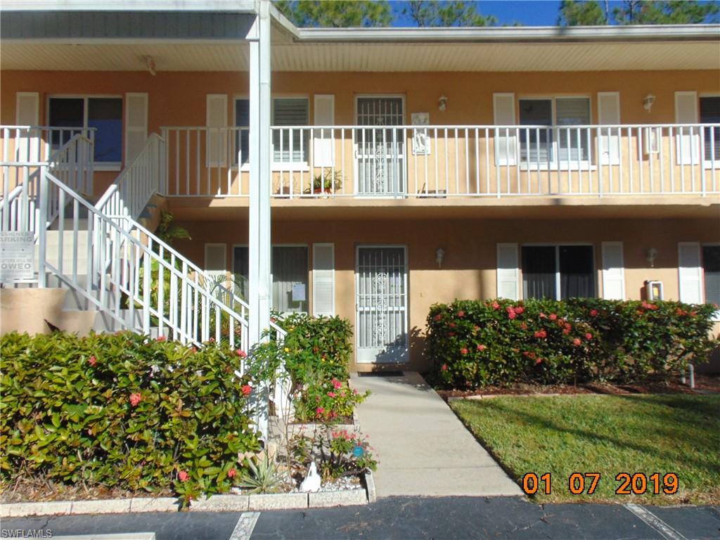 5685 Whitaker Road, Unit C102 Naples, FL 34112 - Photo 1 of 10 front view of a house