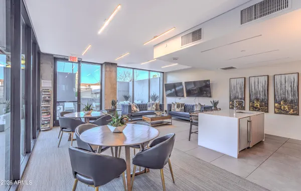 a view of a dining room with furniture window and outdoor view