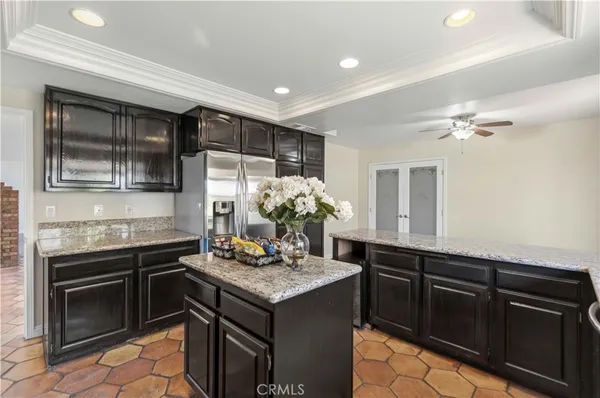a kitchen with a sink and stove