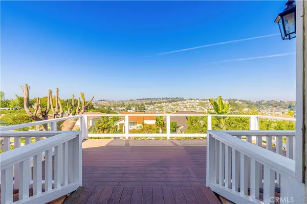 a view of a balcony with an ocean view