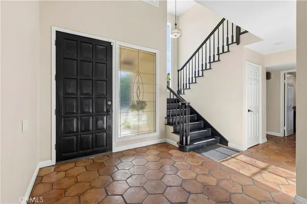 a view of an entryway with staircase