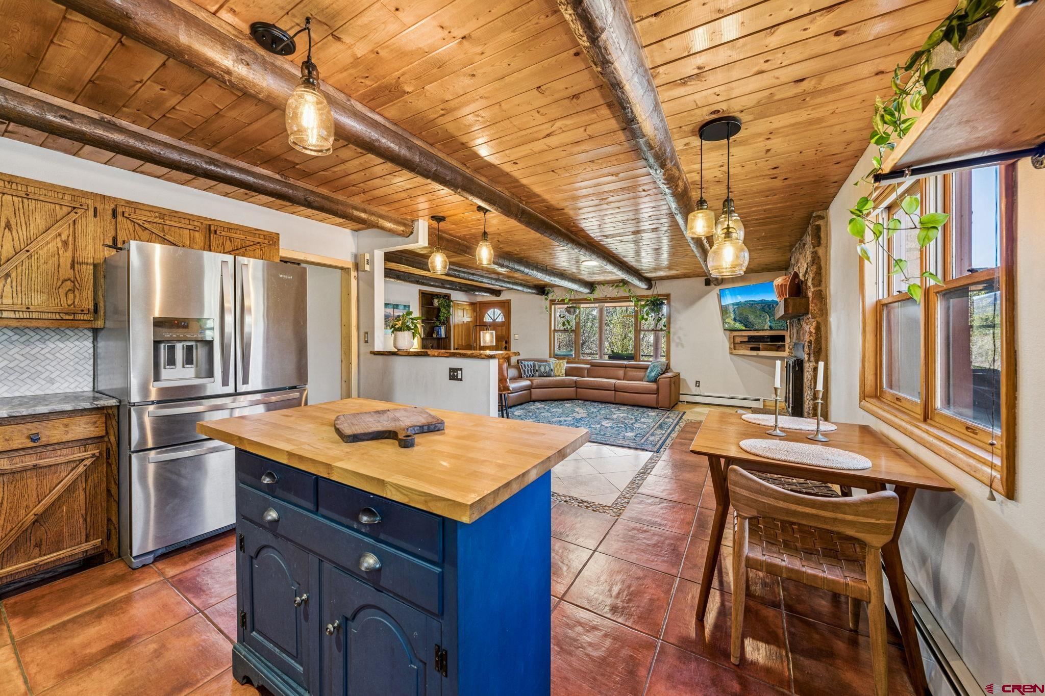 511 High Trails Drive Durango, CO 81301 - Photo 14 of 45 a kitchen with a stove and a refrigerator