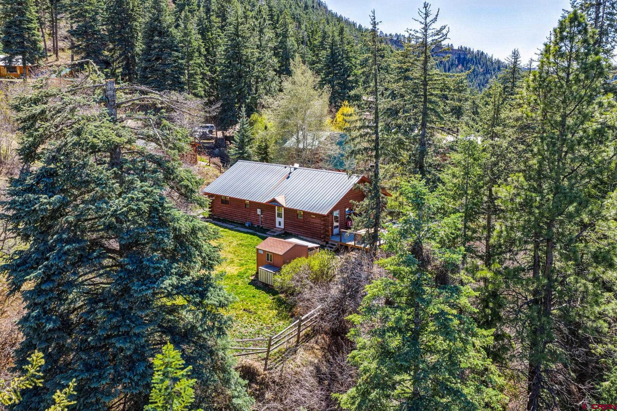 511 High Trails Drive Durango, CO 81301 - Photo 3 of 45 an aerial view of a house with a yard