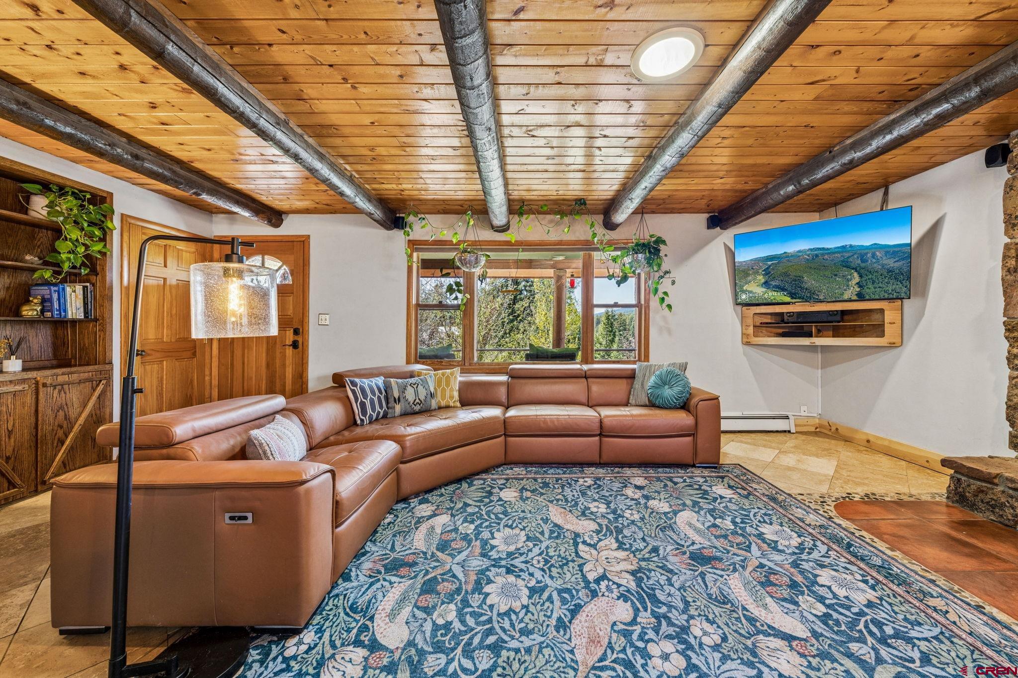 511 High Trails Drive Durango, CO 81301 - Photo 7 of 45 a living room with furniture and a large window