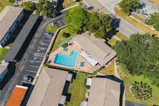 an outdoor space with furniture and city view