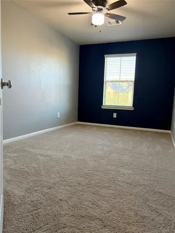 a bathroom with a toilet and a sink