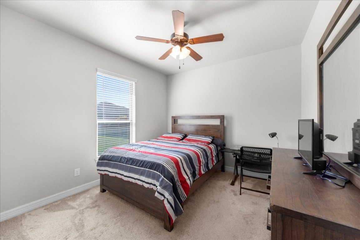 3810 Green Tree Loop Temple, TX 76502 - Photo 17 of 40 Bedroom with light carpet and a ceiling fan