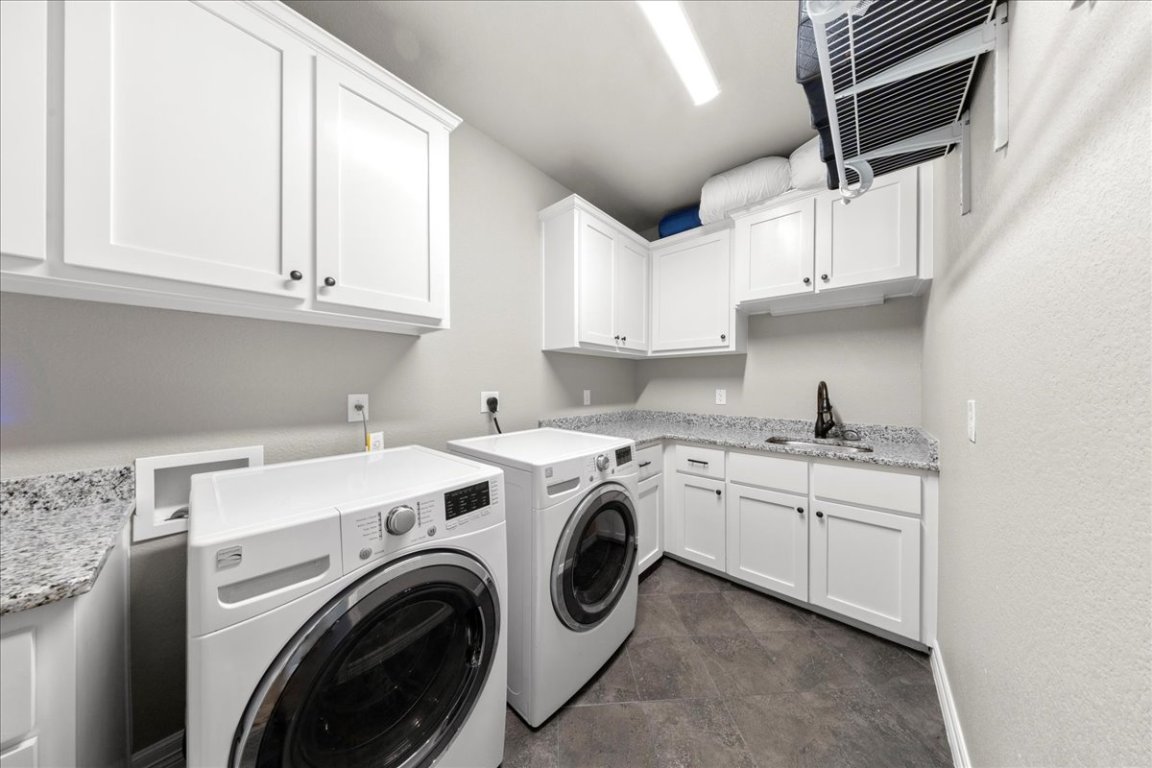 3810 Green Tree Loop Temple, TX 76502 - Photo 20 of 40 a utility room with sink dryer and washer