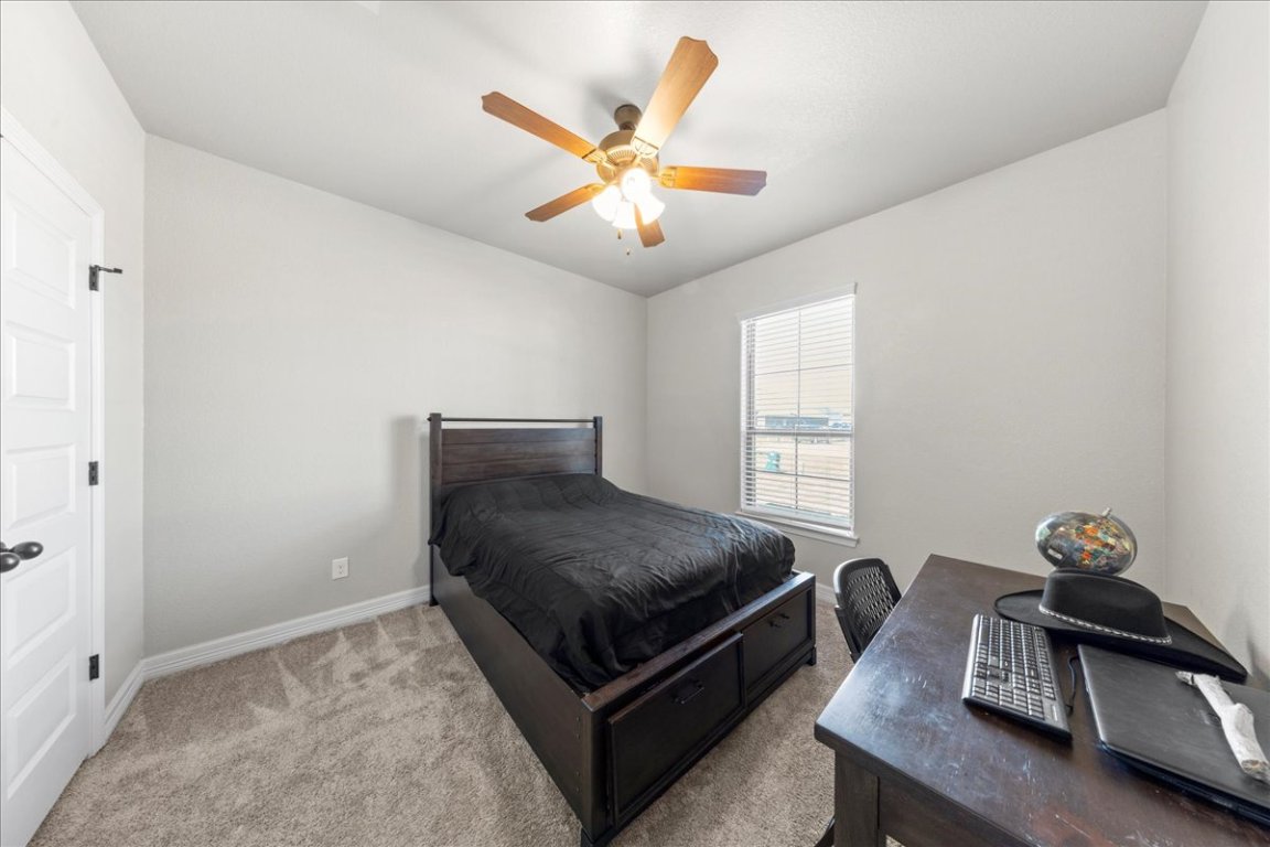 3810 Green Tree Loop Temple, TX 76502 - Photo 22 of 40 a living room with furniture and a window
