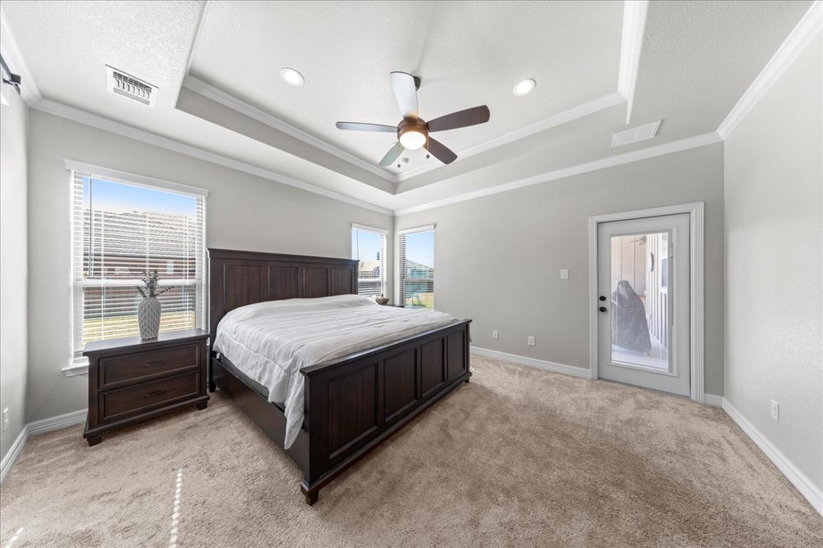 3810 Green Tree Loop Temple, TX 76502 - Photo 26 of 40 a spacious bedroom with a bed and a window