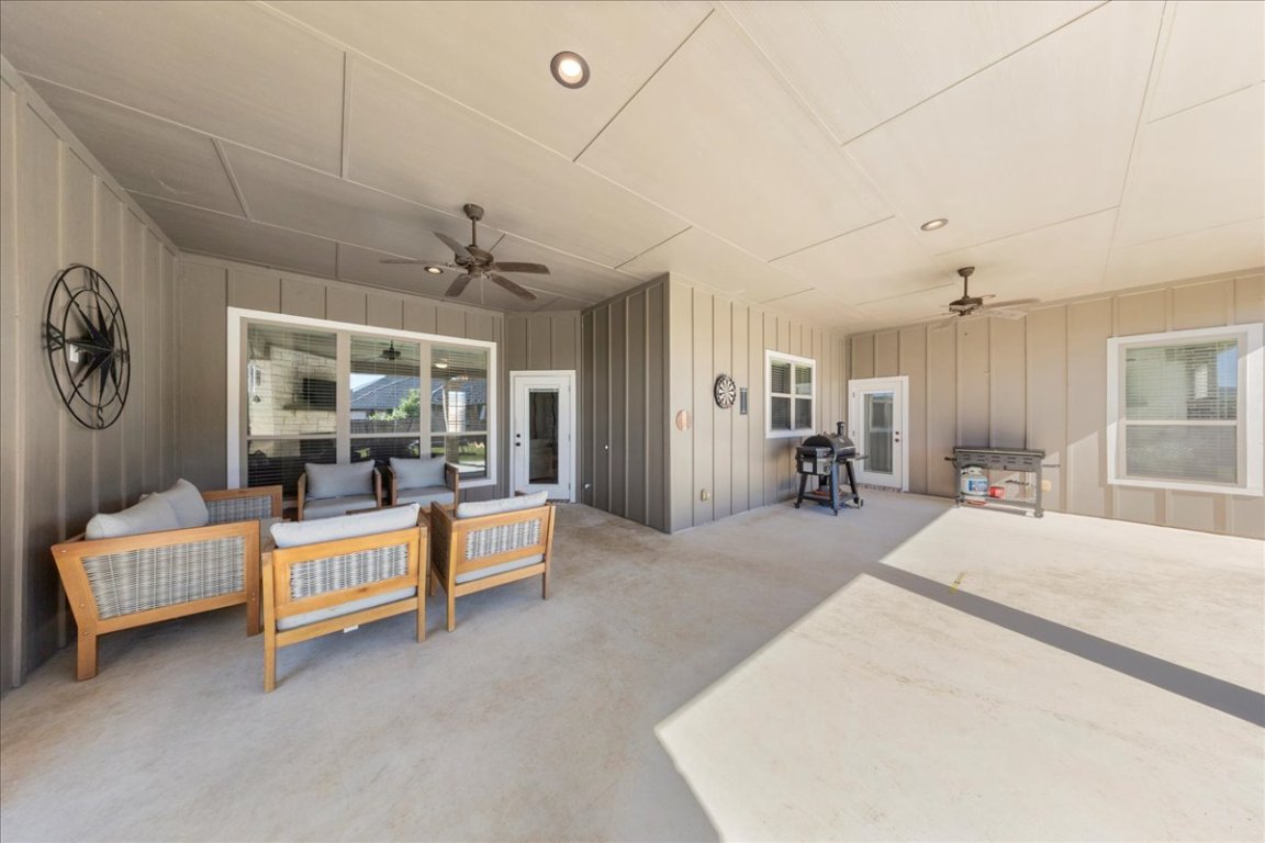 3810 Green Tree Loop Temple, TX 76502 - Photo 35 of 40 a large bedroom with a bed and a large window