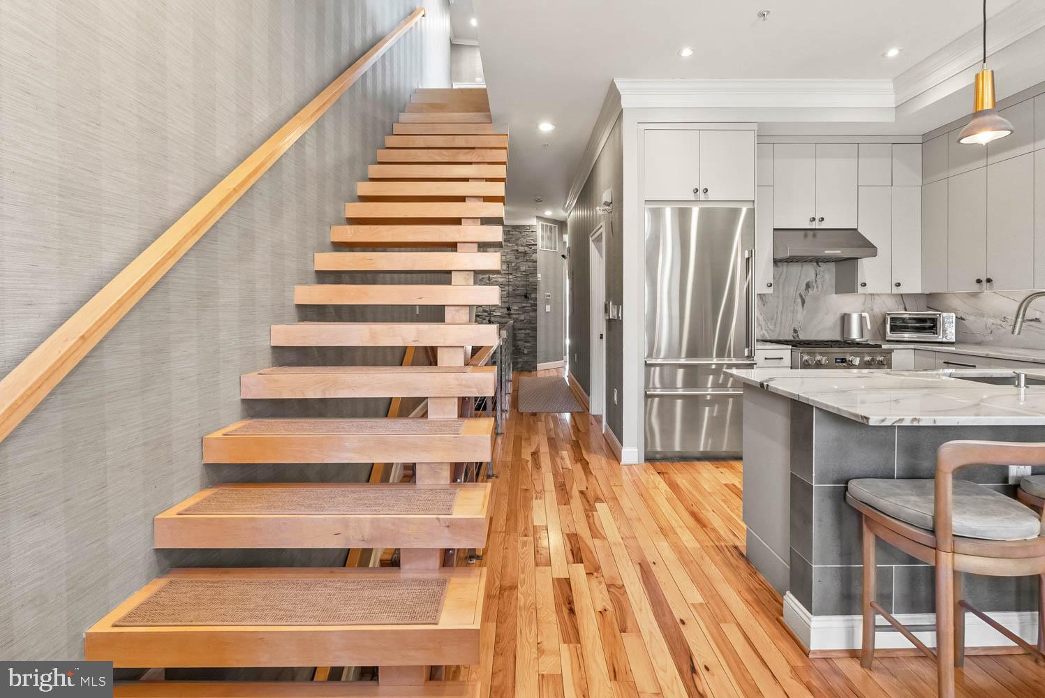 1224 R Street Northwest, Unit 2 Washington, DC 20009 - Photo 21 of 36 a view of kitchen with stainless steel appliances cabinets and wooden floor