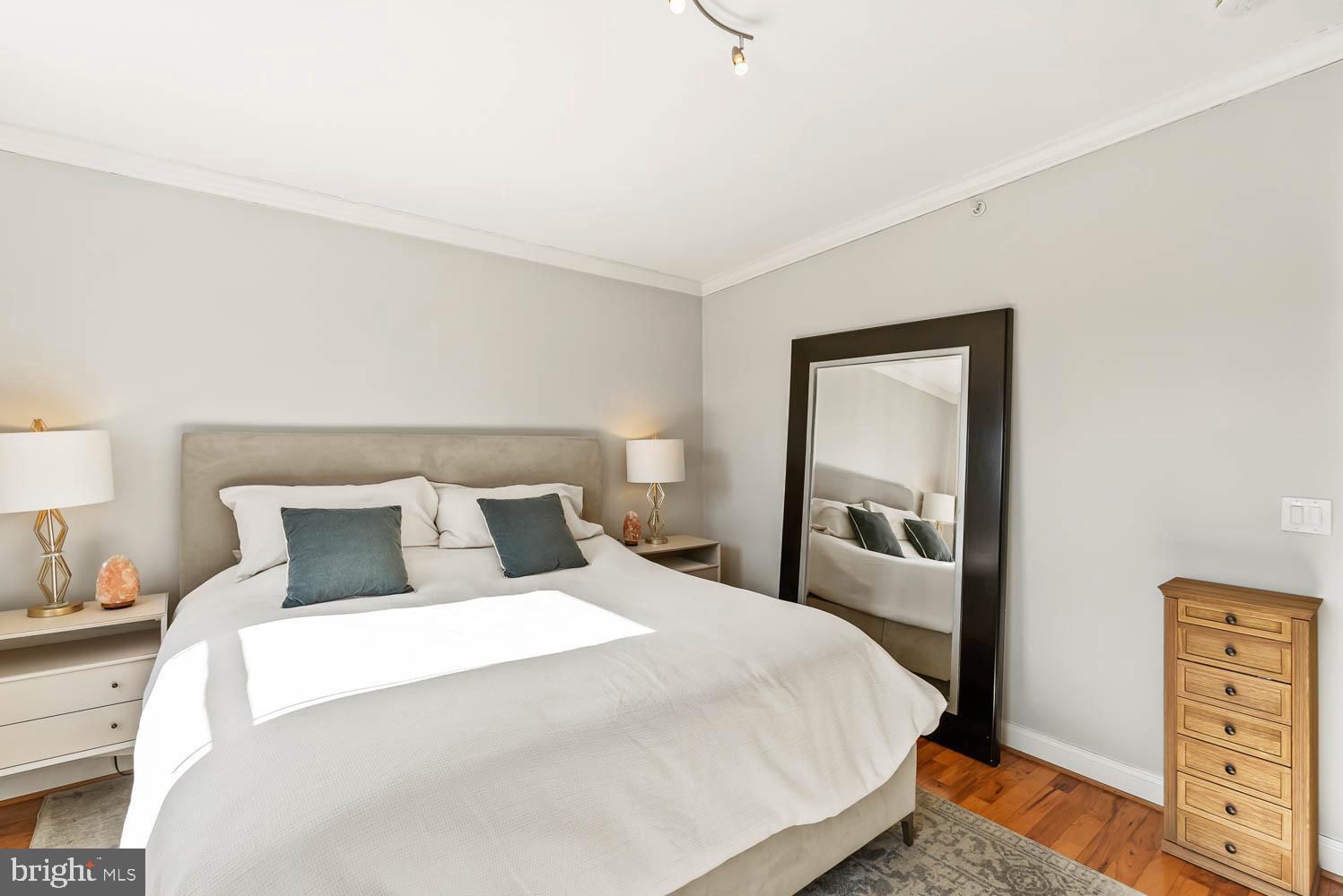 1224 R Street Northwest, Unit 2 Washington, DC 20009 - Photo 26 of 36 a bedroom with a bed and lamp