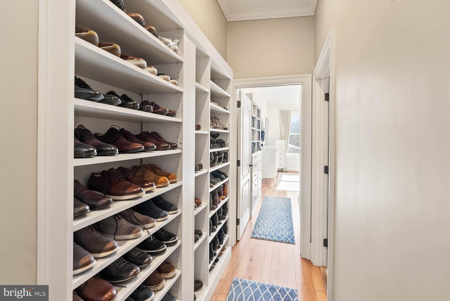 1224 R Street Northwest, Unit 2 Washington, DC 20009 - Photo 28 of 36 a view of walk in closet with clothes and shoes