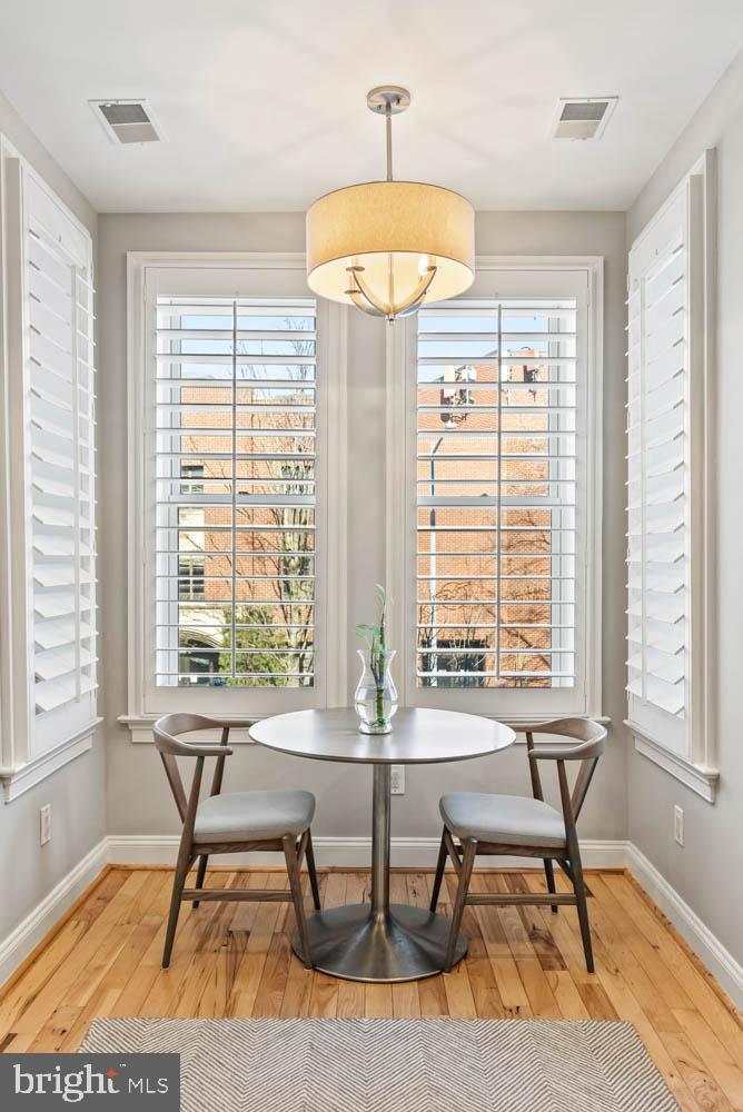 1224 R Street Northwest, Unit 2 Washington, DC 20009 - Photo 3 of 36 a view of a dining room with furniture window and outside view