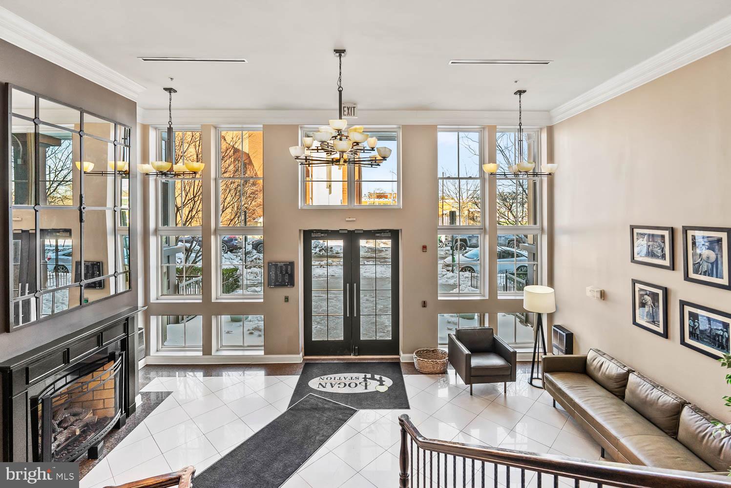 1224 R Street Northwest, Unit 2 Washington, DC 20009 - Photo 34 of 36 a living room with furniture and a floor to ceiling window