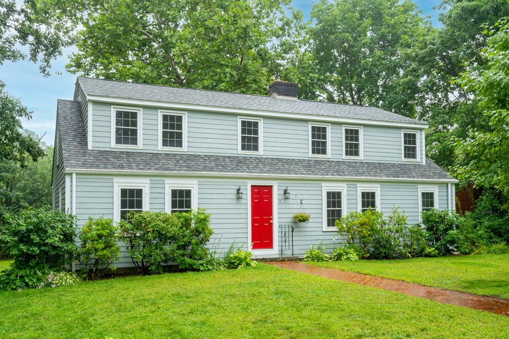 11 Wheelock Road Wayland, MA 01778 - Photo 1 of 24 a front view of house with yard and green space