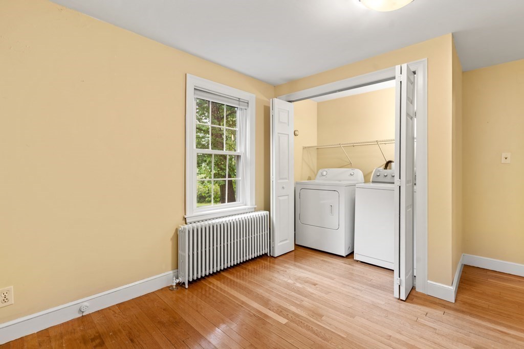 11 Wheelock Road Wayland, MA 01778 - Photo 15 of 24 a view of a room with washer and dryer