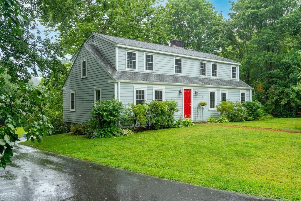 11 Wheelock Road Wayland, MA 01778 - Photo 2 of 24 a front view of house with yard and green space