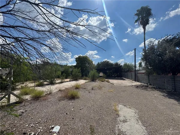 a view of a backyard of a house