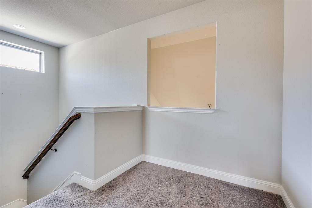 2912 Inn Kitchen Way McKinney, TX 75071 - Photo 13 of 29 an empty room with a window