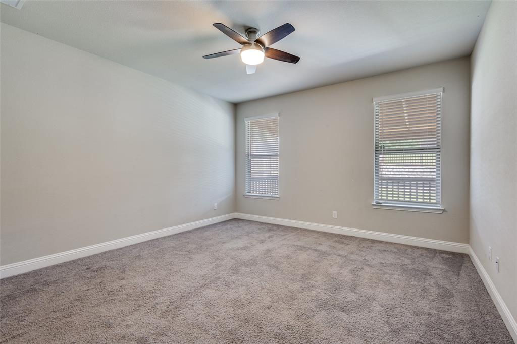 2912 Inn Kitchen Way McKinney, TX 75071 - Photo 17 of 29 a view of an empty room with a window