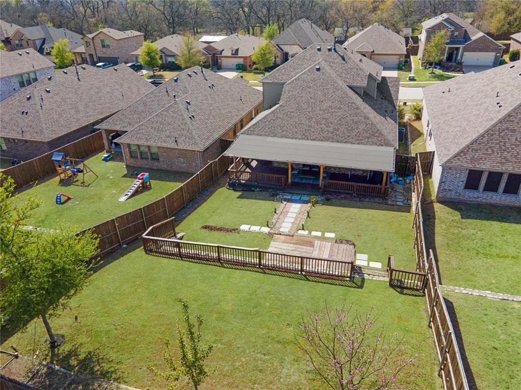 2912 Inn Kitchen Way McKinney, TX 75071 - Photo 26 of 29 an aerial view of a house with swimming pool