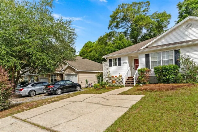 a front view of a house with a patio
