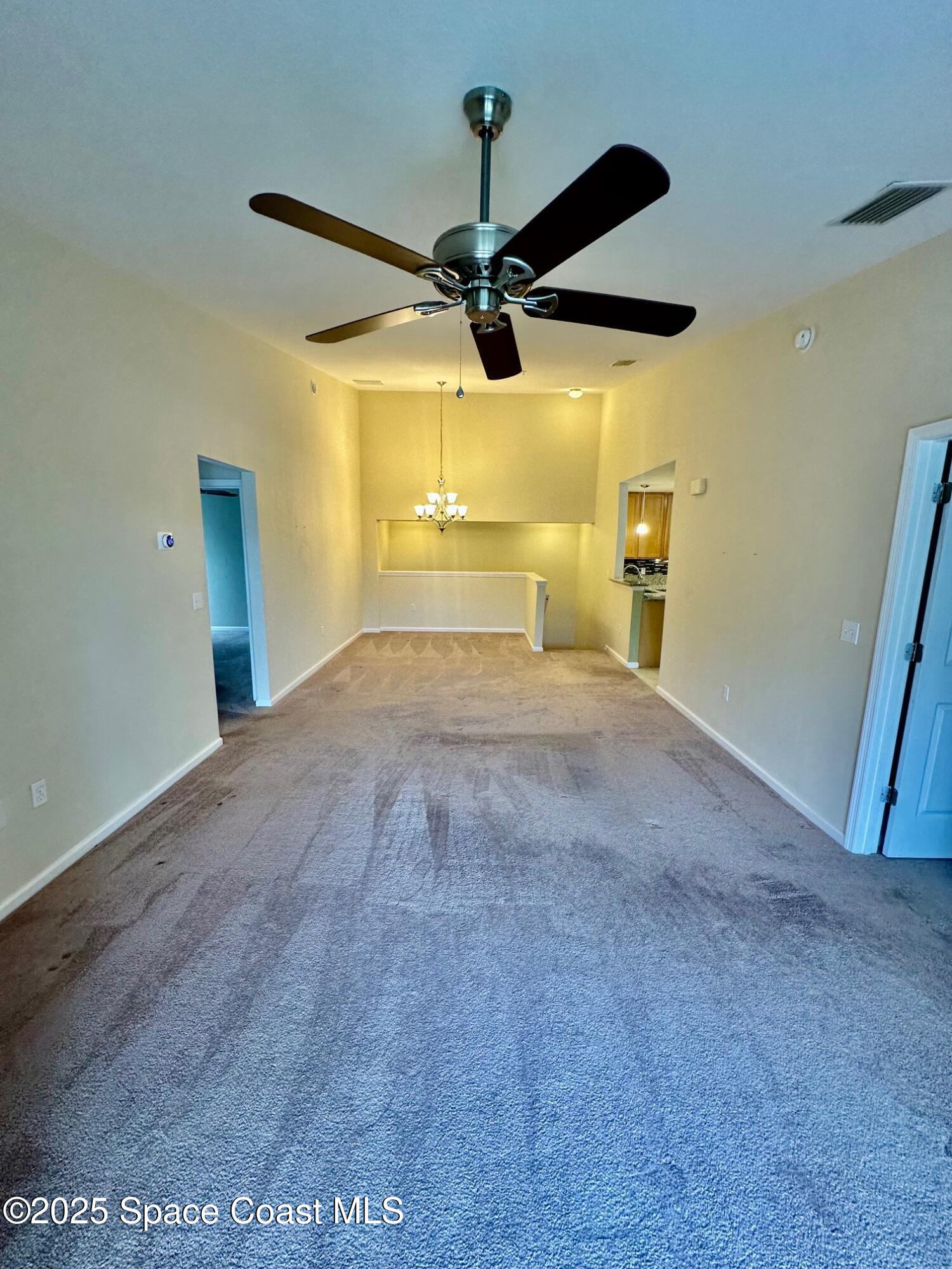 4106 Meander Place, Unit 208 Rockledge, FL 32955 - Photo 16 of 19 a view of a room with a flat screen tv