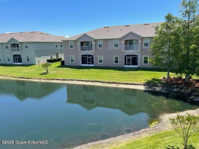 4106 Meander Place, Unit 208 Rockledge, FL 32955 - Photo 3 of 19 a view of a house with a lake view
