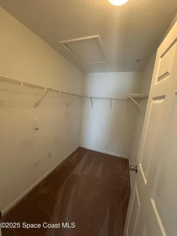 a view of a room with racks on the wall