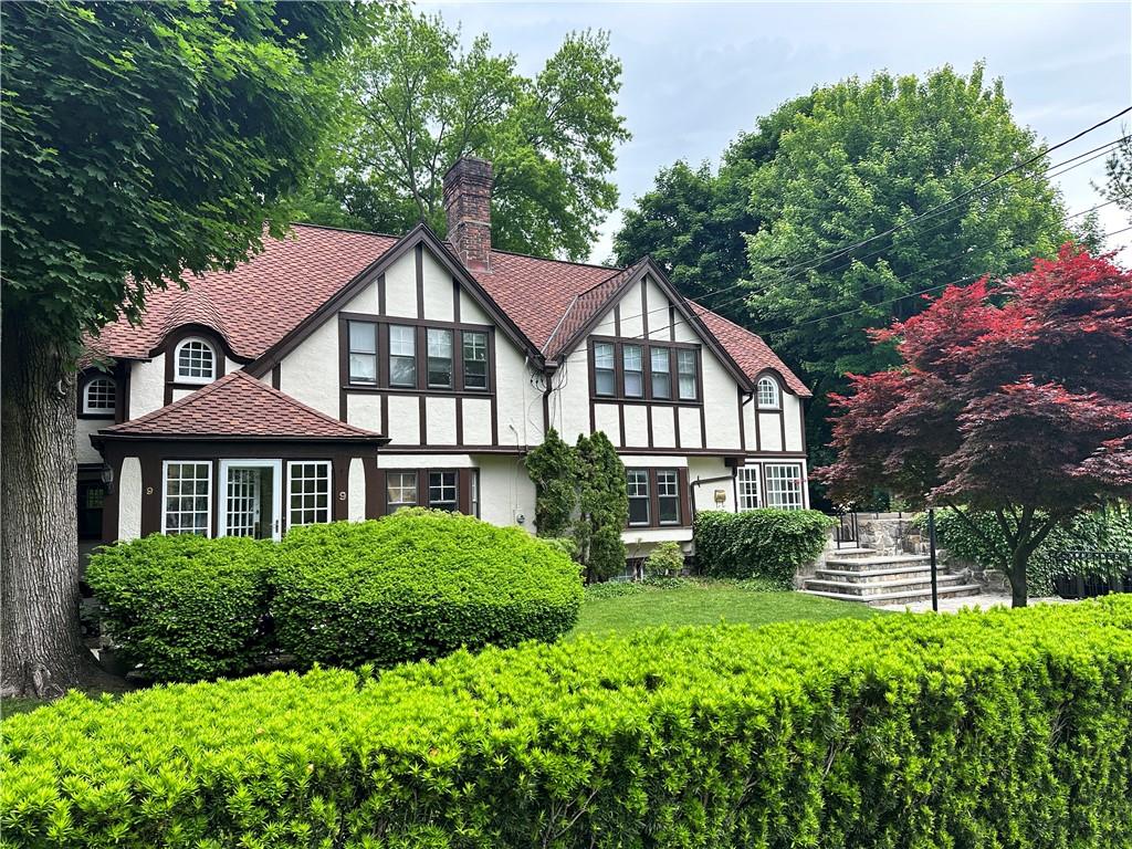a house view with a garden space