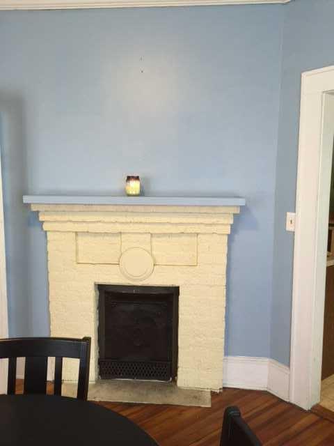 109 West George Street St. George, SC 29477 - Photo 8 of 28 Fire Place in Formal Dining Room