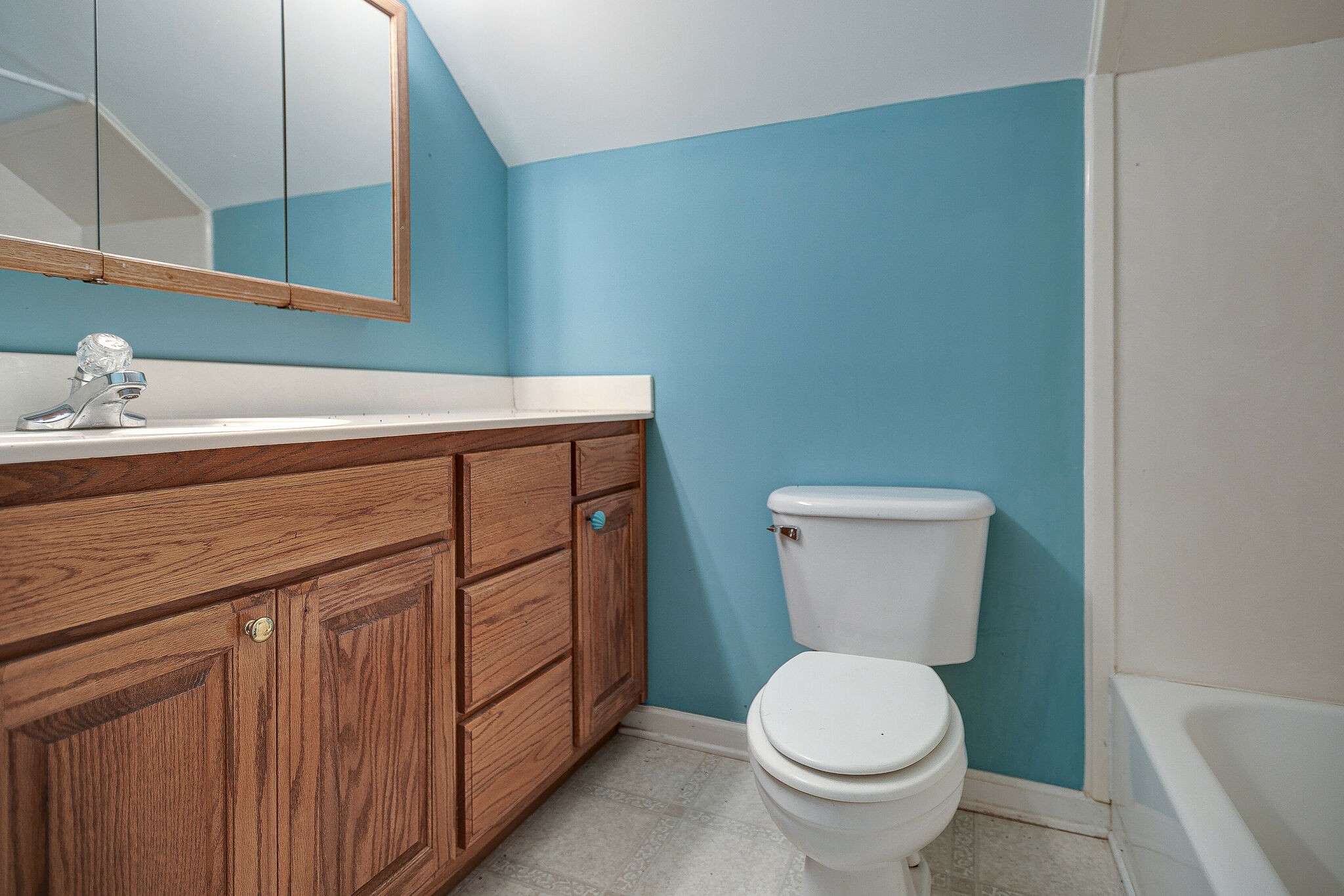 307 Eastside Road Burns, TN 37029 - Photo 25 of 53 a bathroom with a toilet a sink and mirror