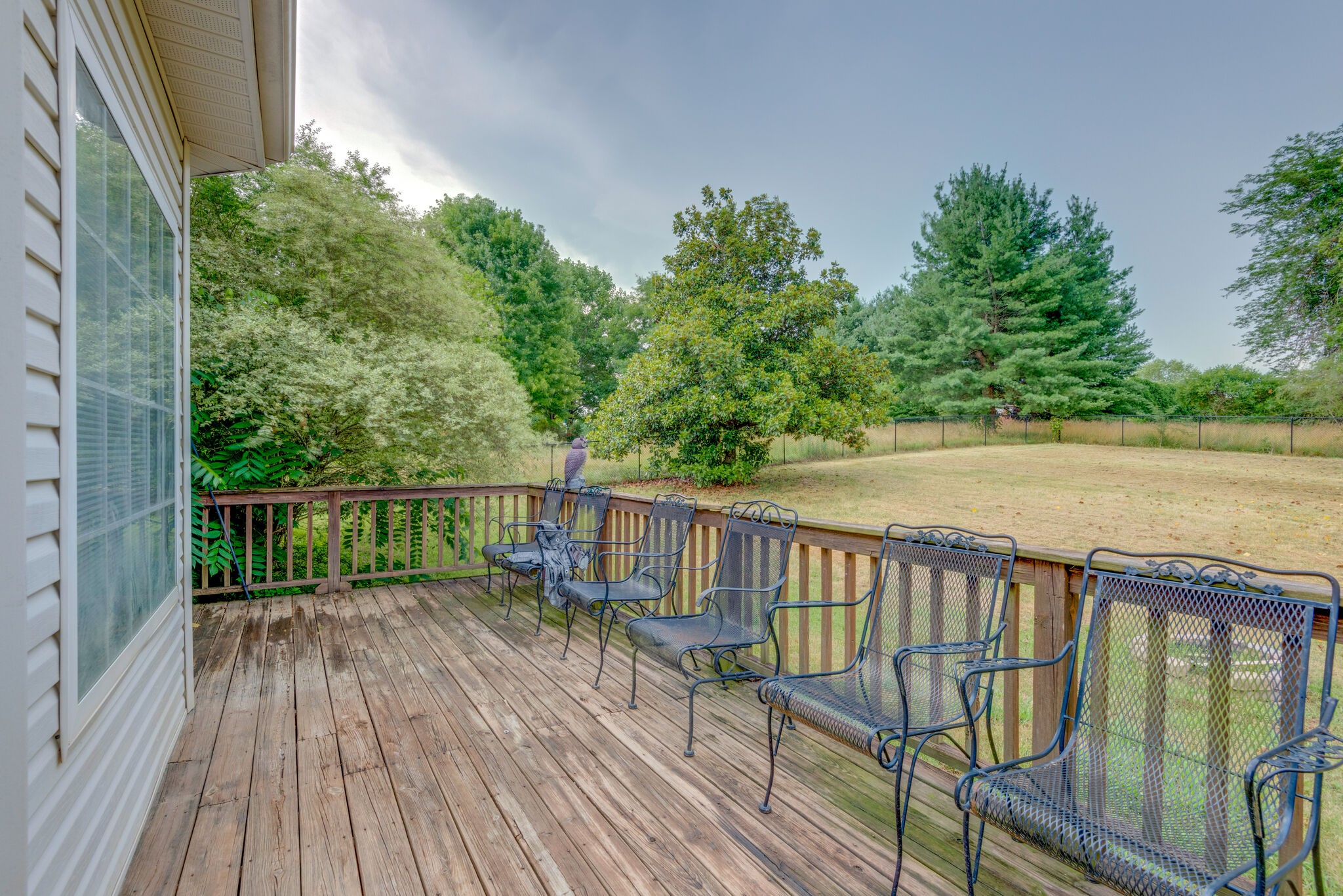 307 Eastside Road Burns, TN 37029 - Photo 29 of 53 a balcony with wooden floor and outdoor space