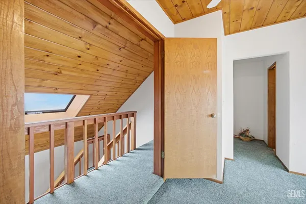 a bed room with a bed and a window