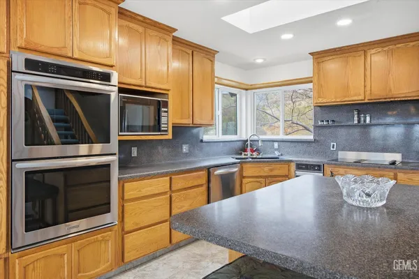 a view of a big room with windows and closet